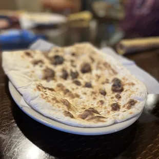 a flat bread on a plate