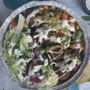 Falafel Rice Platter- delicious with white sauce and green sauce!