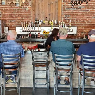 people sitting at a bar