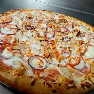 a pizza with onions and cheese