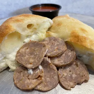 Italian sausage filled calzone
