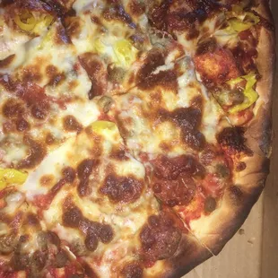 Large pepperoni, sausage, and banana peppers pizza
