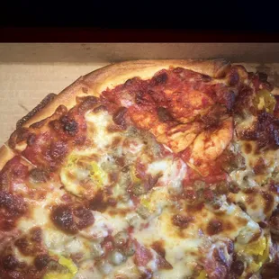 Large pepperoni, sausage, and banana peppers pizza