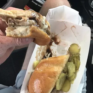 First bite of my Stromboli with mushroom gravy on the toasted hoagie bun! Yum! I don't know if anyone who get the pizza sauce one.