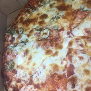 Half jalapeño half cheese pizza