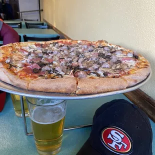 LARGE PIZZA... we had about 5 slices each and 3 left over for home.... We could have finished a large for sure..lol