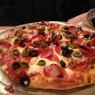 Meat lovers pizza with black and green olives. Dad loved it as a thin crust.