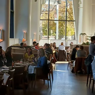 Sweeping windows from entrance through dinning pleasure, while wearing jeans, it's Denver