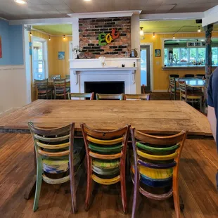 a dining room with a fireplace