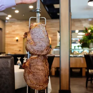 At Passador, meats are prepared to perfection and carved tableside.