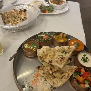 begumi Khazana Lunch Specialty, Thali -  generous portion and Chicken Tikka Masala with garlic naan