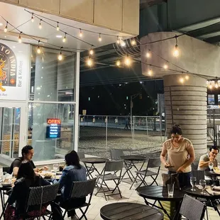 a group of people eating outside