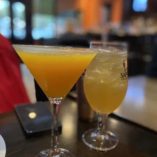 two cocktails on a table