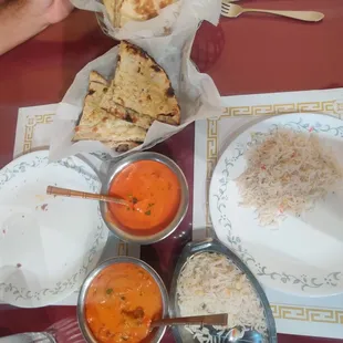 Passage to India, lamb madras, garlic naan and chicken Tikki marsala with basmati rice