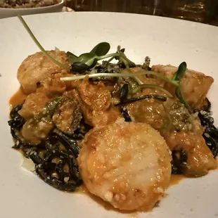 Scallops with squid ink pasta