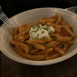 FUSILLI VODKA san marzano tomato + calabrian chile cream whipped ricotta + chive