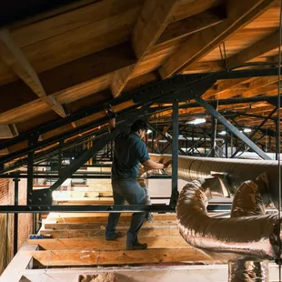 Getting electrical work done in the attic! It takes skills to balance on those beams

405-288-1712