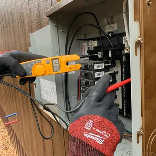 Checking the breaker with a voltage meter!Making sure everything is running smoothly

405-288-1712