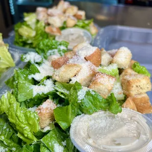 Fresh Caesar salads made in-house daily with our focaccia croutons and scratch Caesar dressing