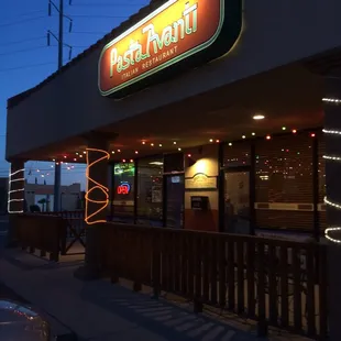 The front, hidden at the end of the shopping center.