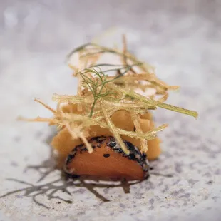 Mezzaluna: trout, charred onion, sesame