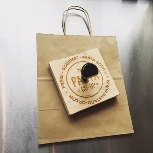 Everything is done in house! Even logo stamping our carry out bags!