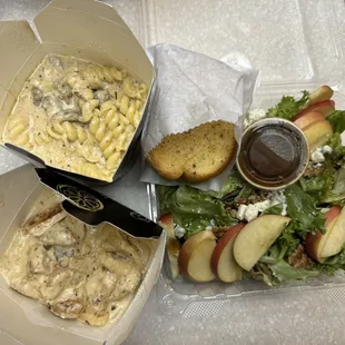 Stroganoff  Chicken Alfredo  Fiji salad  Garlic bread  All yummy!!! And great portions!