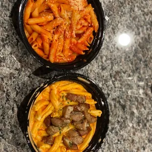 Chefs Pasta with vodka sauce and Italian sausage. Penne Pasta with marinara