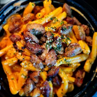 May 2021: Chef Guy Favorite: Vodka Sauce w/ Italian sausage. (Not a fan of thick noodles. Prefer the delicious Pesto sauce.) $11.50 = good