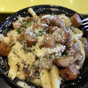 Chefs Pasta with sausage in Aglio d Olie