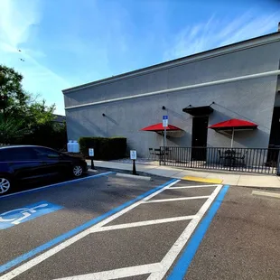 May 2021: Curbside Pick-up &amp; handicapped parking (Southside). Two outside tables