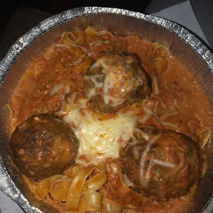 Homemade Fettuccine vodka marinara with meatballs