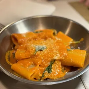 a close up of a bowl of pasta