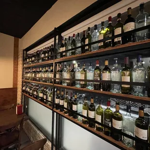 Wall of wines available for your pasta meal