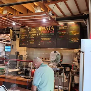 a man working in a restaurant