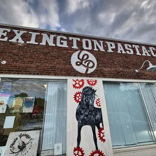 Entrance sign and artwork