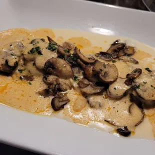 Portobello mushroom ravioli special ordered with the Cajun cream sauce from another dish.  Delicious!