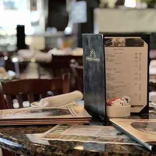 a menu and a menu on a table