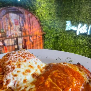 Chicken Parm with spaghetti.