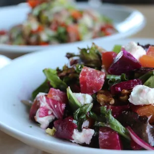 Our NEW Balsamic Beet Salad is made with organic mixed greens, balsamic roasted beets, candied walnuts, and goat cheese.