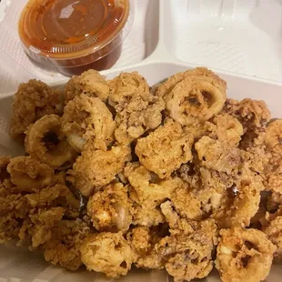 Fried Calamari, too salty, too much batter for the small pieces of squid.  Unappetizing marinara sauce.