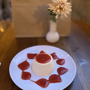 $7 PANNA COTTA: creamy &amp; light. Fresh strawberry sauce on top was not too sweet, perfect! Great portion size after a carb heavy meal.