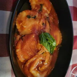 Ricotta ravioli in a mushroom marinara sauce