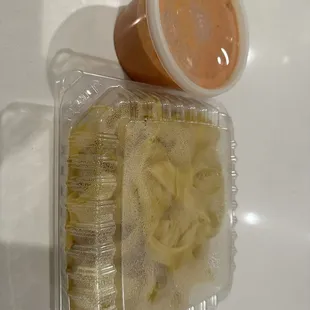 Homemade fresh pasta with their vodka sauce to go