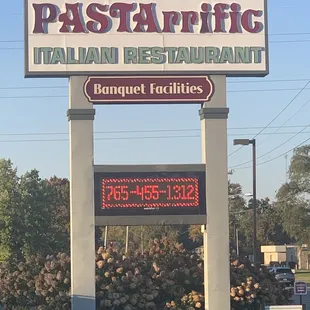 Exterior sign. They take reservations.