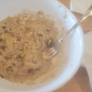 The leftover cacio pipe ( added chicken and mushrooms) risotto.