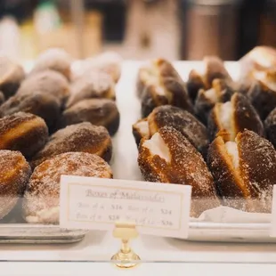 Malassada of various kinds. People favorite: coconut