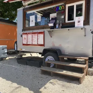 a food truck parked in a parking lot