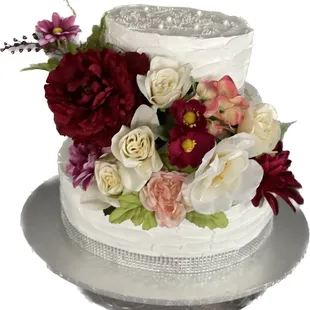 a wedding cake with flowers