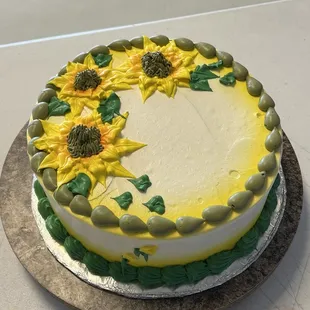 a cake decorated with sunflowers